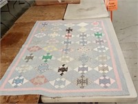 antique hand stitched feedsack material quilt