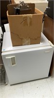 Mini fridge and clipboard (not verified)