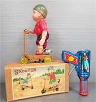 Japan tin & celluloid skooter wind-up toy with box