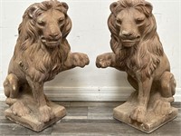 Pair of cement lion garden statues