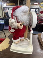 Animated Santa Claus on Scales
