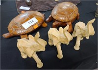 Wooden turtles and elephants