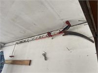 Pole saw  (garage) on wall