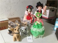 3 dolls; 5 stuffed dogs