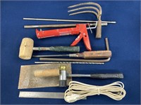 Assorted tools Including caulking gun, rubber