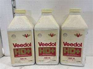 3 jugs of Veedol HD+ motor oil