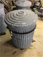 Metal trash can with rollers