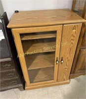 Pressed wood media cabinet 44 inches high X 28 X