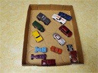 Box of toy cars, trucks