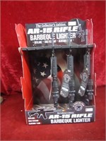 (3)NOS AR-15 rifle Barbeque lighters.