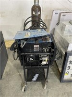 2pc MILLER 211 AUTO SET WELDERS WITH CART AND 2