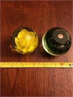 Lot of 2 paperweights- green one has damage on bo