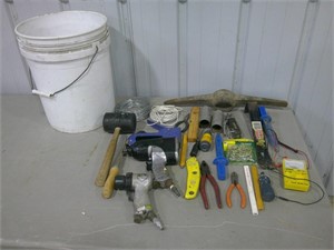 air guns, hammers, pliers, tools, bucket