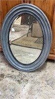 Beveled Mirror in Oval Plastic Frame