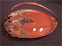 Metal handled tray embossed with grapes
