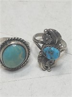 2 silver and turquoise southwest style rings.