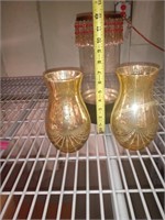 2 glass vases and hurricane candle holder..