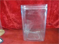 Antique battery glass canister.