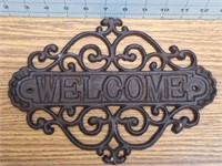 Cast iron welcome sign