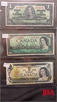 sheet with 3 Canadian $1 bills