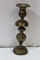 A Single Brass Ornate Candlestick