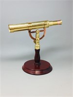 Small brass telescope with mount
