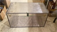 Large plexi glass box with rope handles.  Has