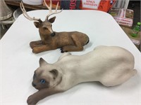Resin deer 12” long  and cat 15” long