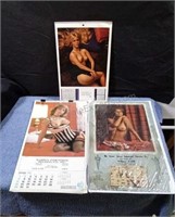 Vintage calendars with topless women photos