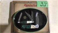 Remington knife set in collector tin. NEW