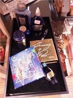 Container of Evening in Paris items including