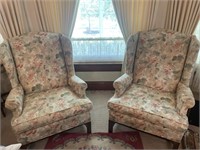 2 upholstered‘s living room chairs, one chair has