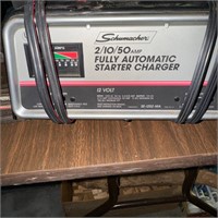 Schumacher Battery charger and jumper cables.