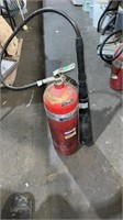 Tall fire extinguisher