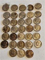 32-MIXED DATES OF KENNEDY HALVES