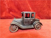 Antique cast iron Ford Model T car toy.