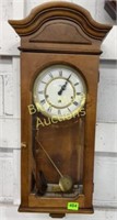Howard Miller clock w/key & pendulum-work needed
