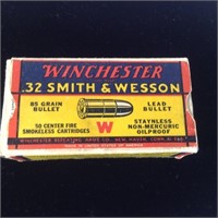 Vintage Winchester .32 caliber box and ammo