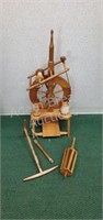 Vintage wooden spinning wheel, one piece has been