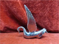 Antique flying swan hood ornament.