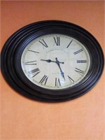 Wall clock, battery operated
Measures 20"