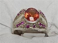 RING MARKED 925 SILVER OVAL ORANGE STONE