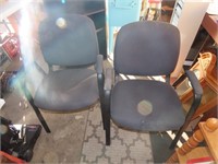 Pair stackable office chairs.