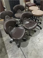 6 Small Rolling Office Chairs.