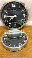 Two shop clocks