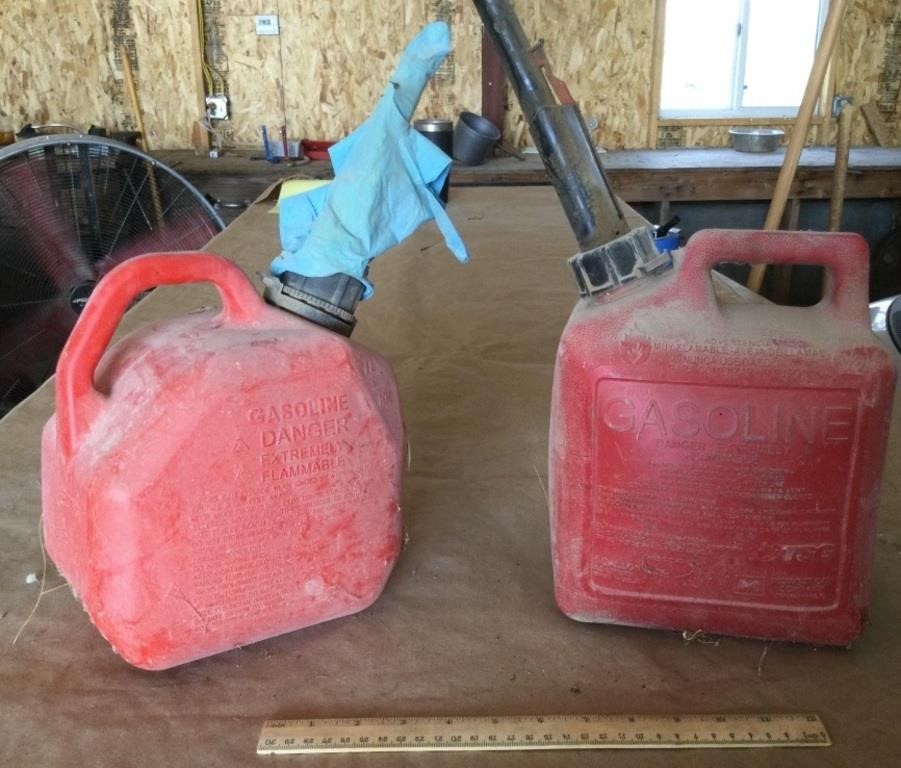 2- 1 gallon gas jugs- 1 full - 1 empty