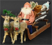 SANTA IN WOOD SLEIGH WITH TWO REINDEER CANDY CONTA
