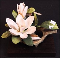A Cybis figurine of magnolia flower on wood base,