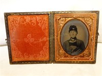 Antique Civil War Soldier holding book-
