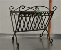 Wrought iron folding magazine rack